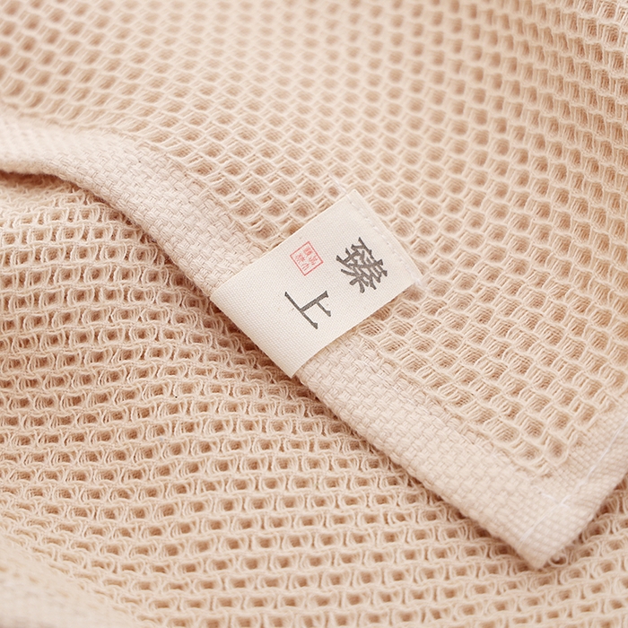 91家纺网 家纺一手货源 找家纺 2024新款北欧风素色布标全棉蜂窝华夫格透气枕巾52*78cm一对 北欧风-茶白