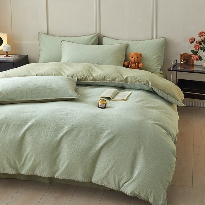 91家纺网 家纺一手货源 找家纺 吉象家纺 2024新款A类全棉色织水洗棉贝壳边三角针四件套    秘境浅绿