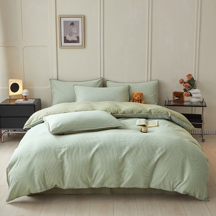 91家纺网 家纺一手货源 找家纺 吉象家纺 2024新款A类全棉色织水洗棉贝壳边三角针四件套    秘境浅绿