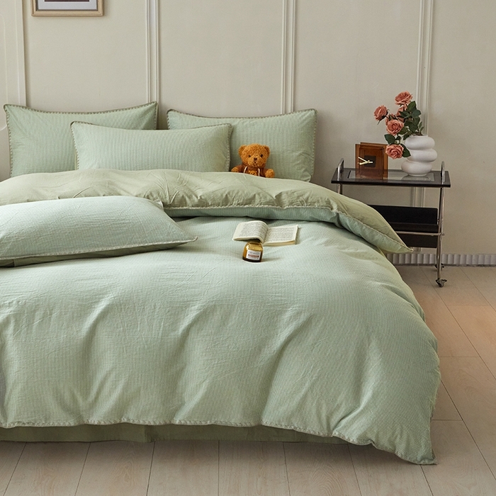 91家纺网 家纺一手货源 找家纺 吉象家纺 2024新款A类全棉色织水洗棉贝壳边三角针四件套    秘境浅绿