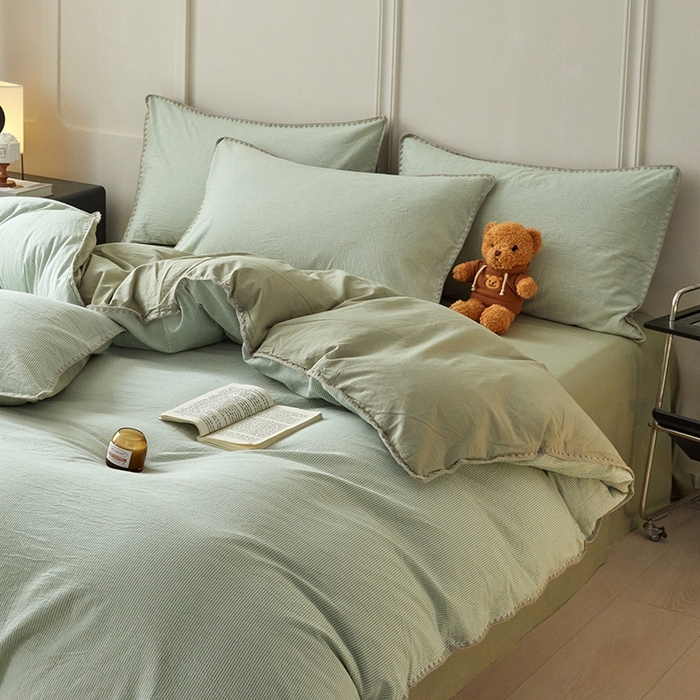 91家纺网 家纺一手货源 找家纺 吉象家纺 2024新款A类全棉色织水洗棉贝壳边三角针四件套    秘境浅绿