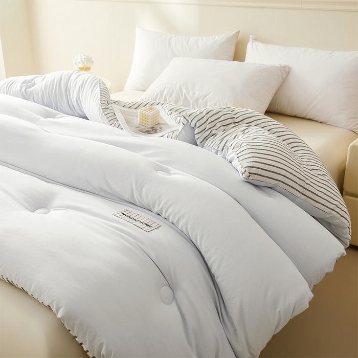 91家纺网 家纺一手货源 找家纺 荔禾家居 2024新款A类素色条纹双拼大豆被子被芯 条纹-洱海蓝