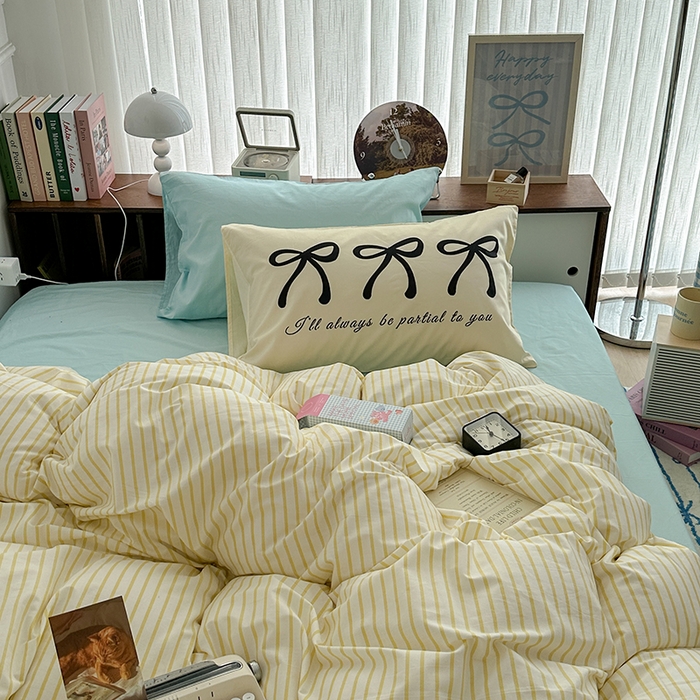 91家纺网 家纺一手货源 找家纺 昔可家纺 2024新款竖条全棉四件套大版枕套系列 嫩黄条纹