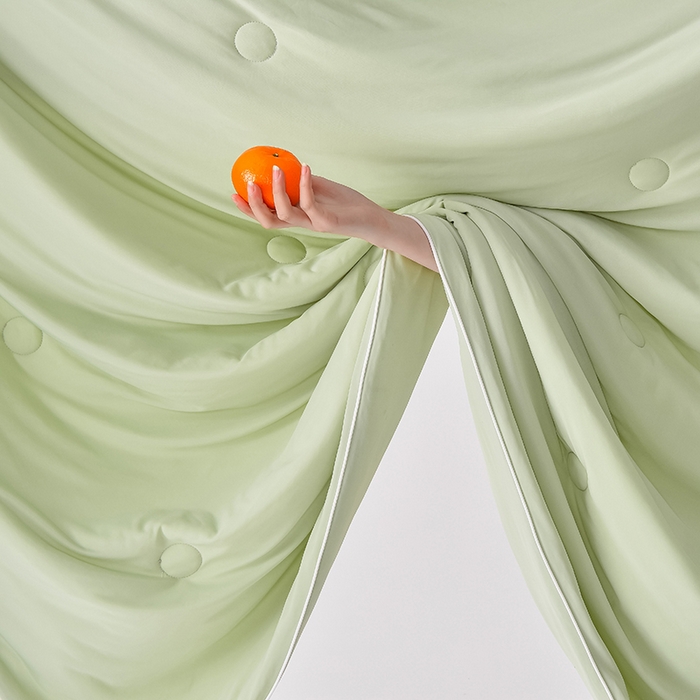 91家纺网 家纺一手货源 找家纺 2024新款凉感丝100%锦纶170克凉感丝冰淇淋A类抗菌夏凉被空调被 牛油果绿