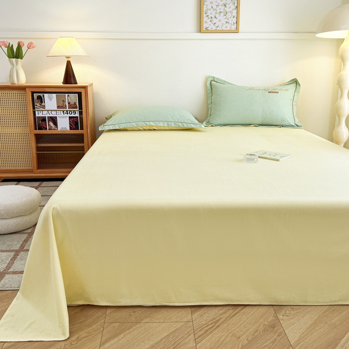 91家纺网 家纺一手货源 找家纺 菲梵家纺 2025新款纯色双拼全棉加厚磨毛刺绣款套单床单（自然光场景） 气质黄