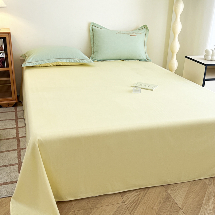 91家纺网 家纺一手货源 找家纺 菲梵家纺 2025新款纯色双拼全棉加厚磨毛刺绣款套单床单（自然光场景） 气质黄