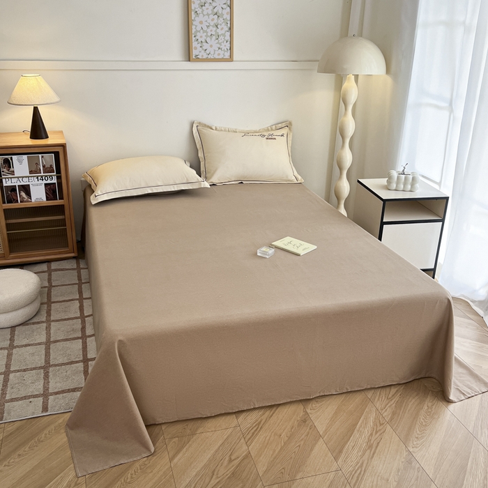 91家纺网 家纺一手货源 找家纺 菲梵家纺 2025新款纯色双拼全棉加厚磨毛刺绣款套单床单（自然光场景） 奶茶