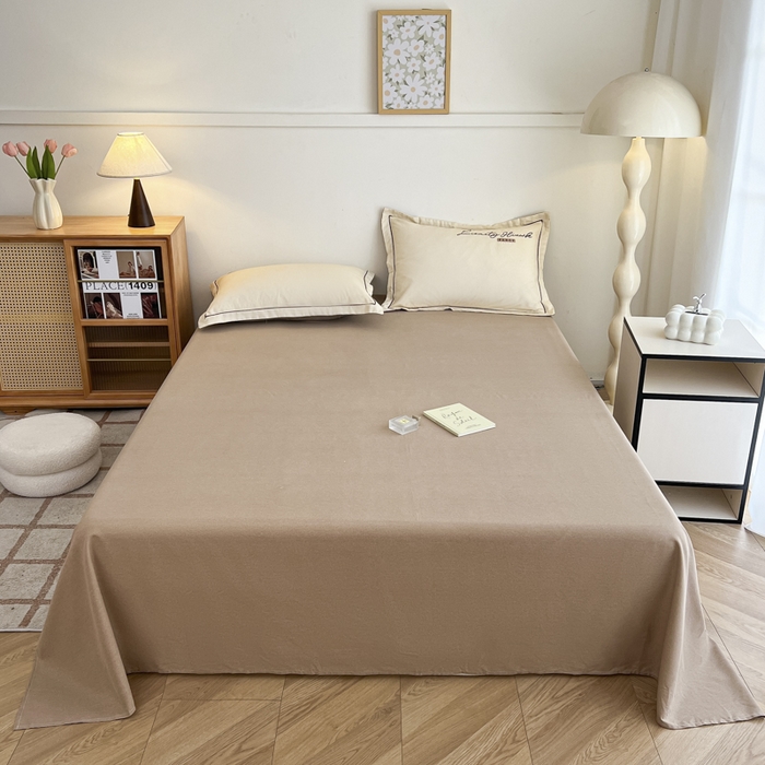 91家纺网 家纺一手货源 找家纺 菲梵家纺 2025新款纯色双拼全棉加厚磨毛刺绣款套单床单（自然光场景） 奶茶