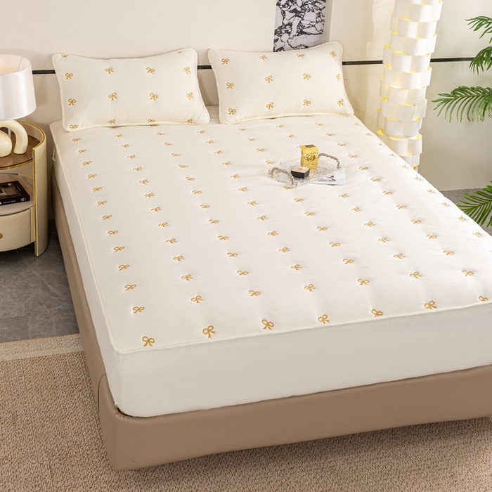 91家纺网 家纺一手货源 找家纺 米柳家纺 2024新款水洗棉大豆夹棉床笠 蝴蝶结-米白