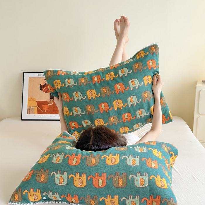 91家纺网 家纺一手货源 找家纺 朴尔家纺-毛巾被 2024新款防滑半包可调节暗扣魔术全棉三层纱布枕巾 多彩小象-绿黄53*110cm/对