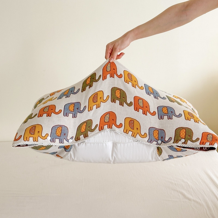 91家纺网 家纺一手货源 找家纺 朴尔家纺-毛巾被 2024新款防滑半包可调节暗扣魔术全棉三层纱布枕巾 多彩小象-米白53*110cm/对