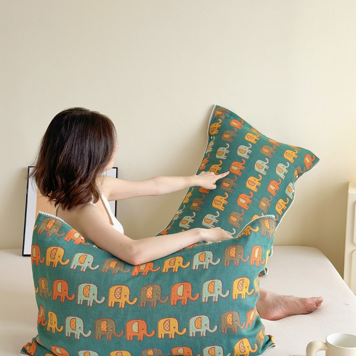 91家纺网 家纺一手货源 找家纺 朴尔家纺-毛巾被 2024新款防滑半包可调节暗扣魔术全棉三层纱布枕巾 多彩小象-绿黄53*110cm/对