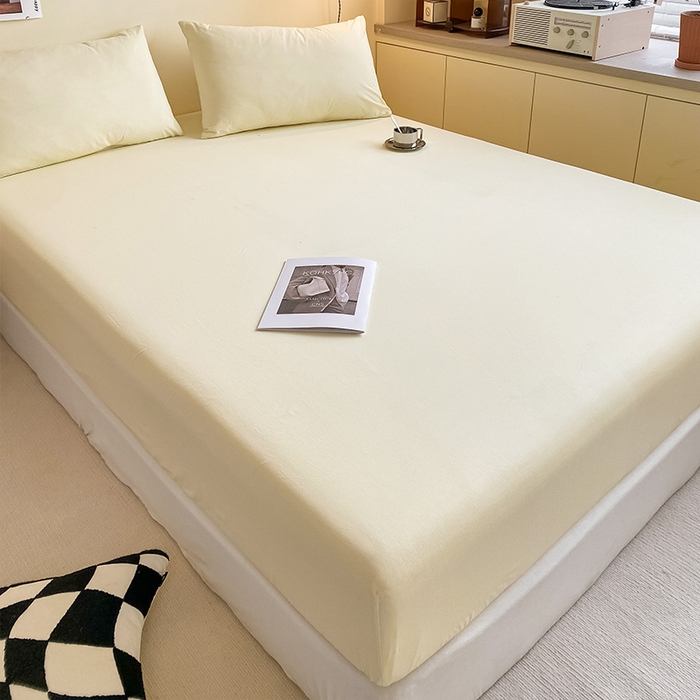 91家纺网 家纺一手货源 找家纺 眠帛家居 2024新款A类亲肤水洗棉纯色单品床笠三件套 奶黄
