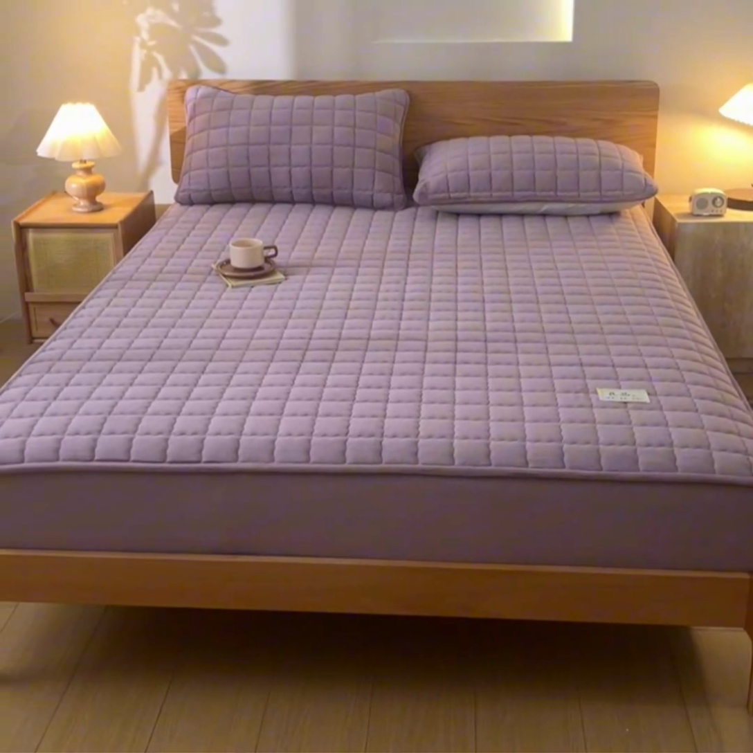 91家纺网 家纺一手货源 找家纺 鑫钰 2024新款A类无印风牛奶绒大豆夹棉床笠-暖格 暖格-紫色