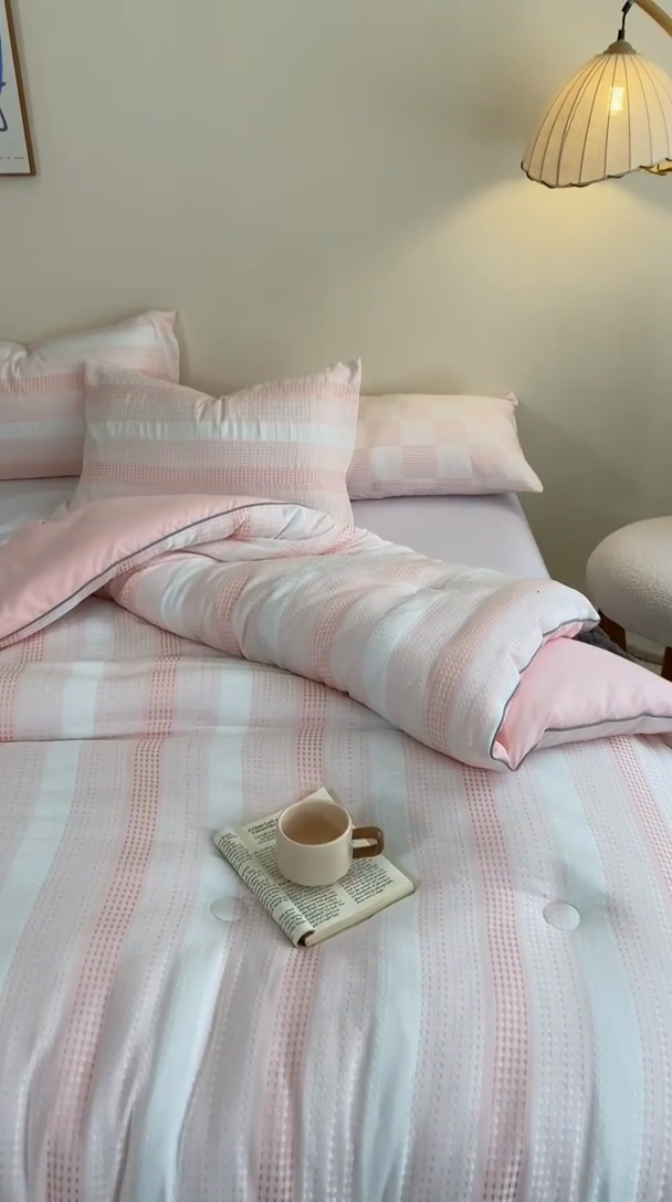 91家纺网 家纺一手货源 找家纺 吾诺家居 2024新款大提花格子秋冬被被子被芯 条纹粉