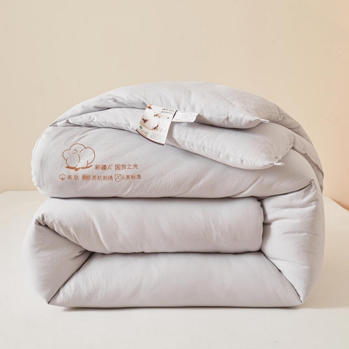 91家纺网 家纺一手货源 找家纺 2025新款A类刺绣新疆棉花被被子被芯 浅灰