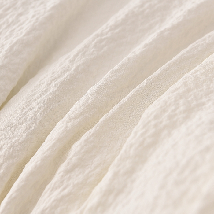 91家纺网 家纺一手货源 找家纺 富威堡家纺 2025新款A类泡泡纱新疆棉花被 奶昔白