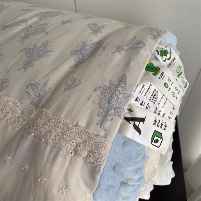 91家纺网 家纺一手货源 找家纺 2025新款秋冬季棉加豆豆绒法式花边款豆豆被被芯铃兰花开