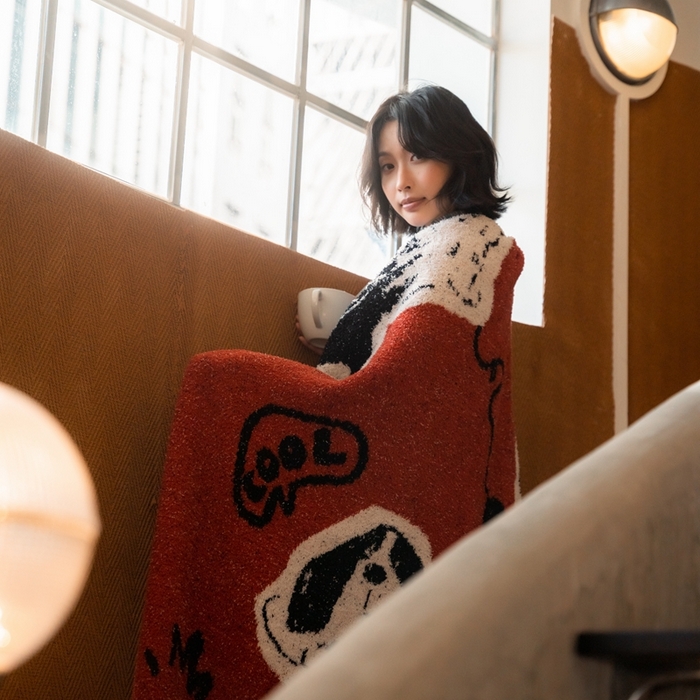 91家纺网 家纺一手货源 找家纺 圆岛 2024新款多功能针织半边绒毛毯 抽象小狗