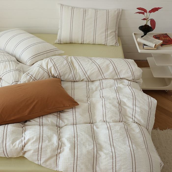 91家纺网 家纺一手货源 找家纺 棉眠 2024新款水洗皱皱纱色织提花线条混搭系列四件套 咖黄细条配嫩黄