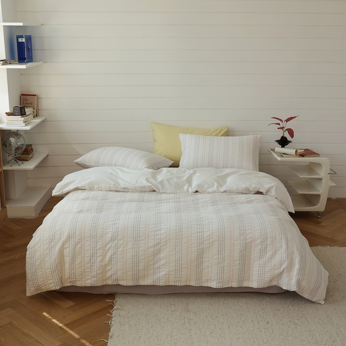 91家纺网 家纺一手货源 找家纺 棉眠 2024新款水洗皱皱纱色织提花线条混搭系列四件套 紫粉细条配浅紫