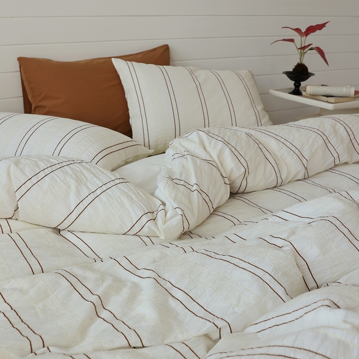 91家纺网 家纺一手货源 找家纺 棉眠 2024新款水洗皱皱纱色织提花线条混搭系列四件套 咖黄细条配嫩黄