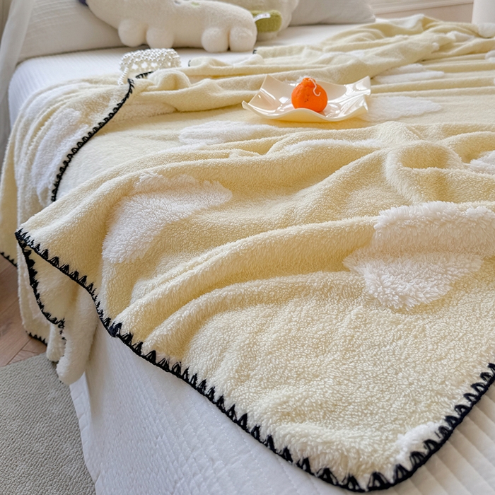 91家纺网 家纺一手货源 找家纺 吉象家纺 2024新款A类高克重棉舒绒贝壳包边毛毯 白云朵朵黄