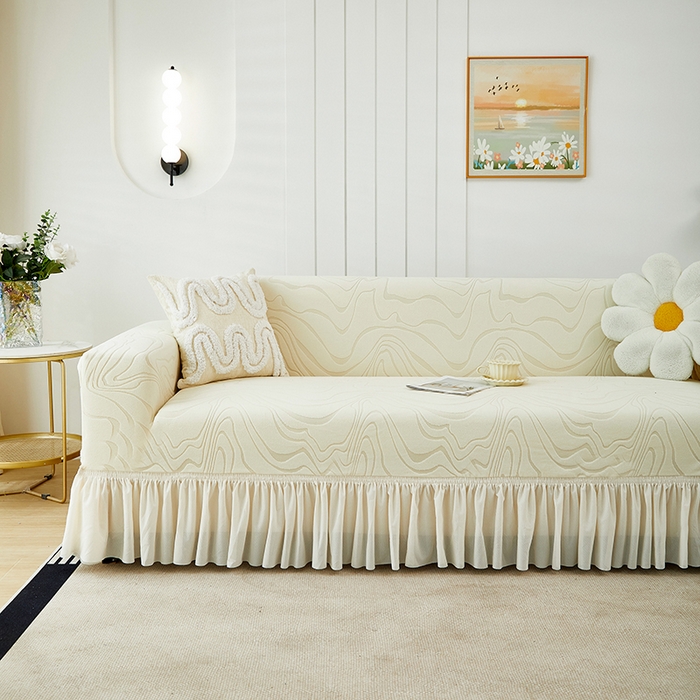 91家纺网 家纺一手货源 找家纺 丝绮鹿 2024新款雕花绒曲意系列沙发套裙边款（三人图） 米白