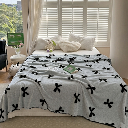 吉象家纺 2024新款A类高克重棉舒绒贝壳包边毛毯 同心结