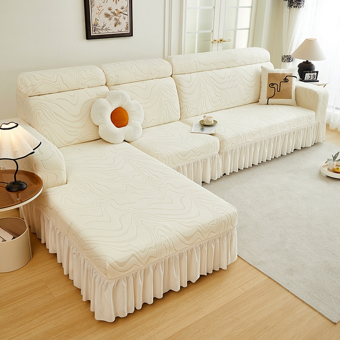 91家纺网 家纺一手货源 找家纺 丝绮鹿 2024新款雕花绒曲意系列沙发套裙边款（贵妃图） 米白