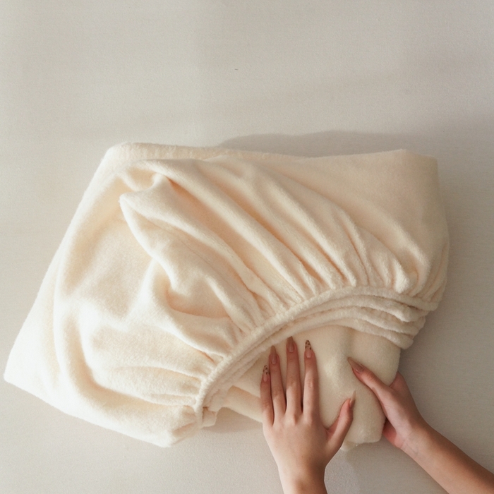 91家纺网 家纺一手货源 找家纺 三味舒屋 2025秋冬新款仿生羊毛绒安可拉系列单品床笠枕套 蛋奶黄