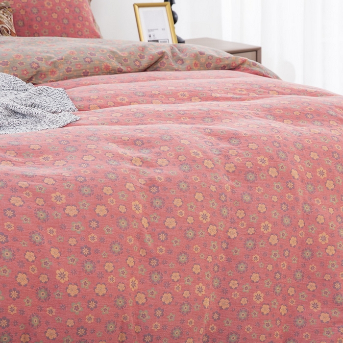 91家纺网 家纺一手货源 找家纺 鲁爱 2024新款全棉色织双层纱纽扣款四件套 花香四溢-粉