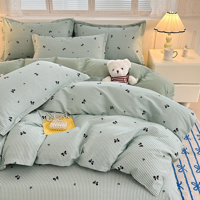 91家纺网 家纺一手货源 找家纺 绵庭家纺 2025新款全棉印花四件套系列 绿底蝴蝶结