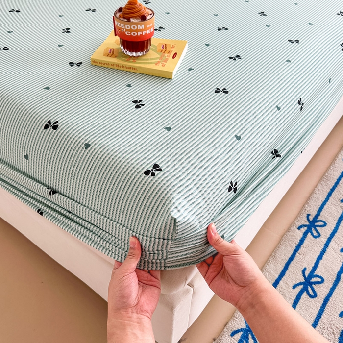 91家纺网 家纺一手货源 找家纺 绵庭家纺 2025新款全棉印花单床笠系列 绿底蝴蝶结