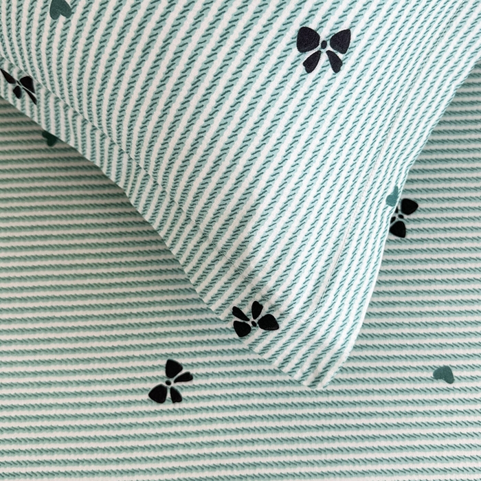 91家纺网 家纺一手货源 找家纺 绵庭家纺 2025新款全棉印花单枕套系列 绿底蝴蝶结