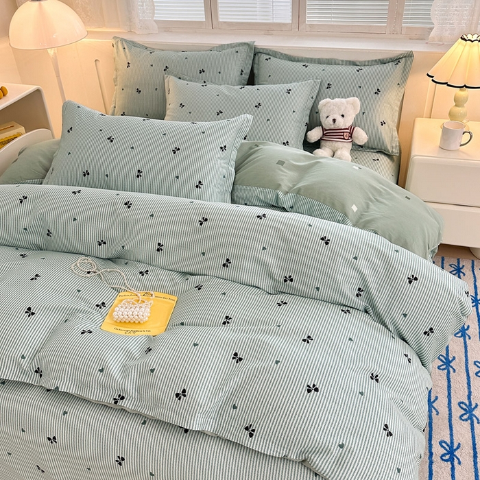 91家纺网 家纺一手货源 找家纺 绵庭家纺 2025新款全棉印花四件套系列 绿底蝴蝶结