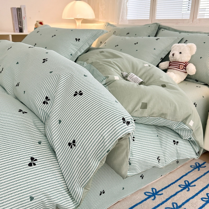 91家纺网 家纺一手货源 找家纺 绵庭家纺 2025新款全棉印花四件套系列 绿底蝴蝶结