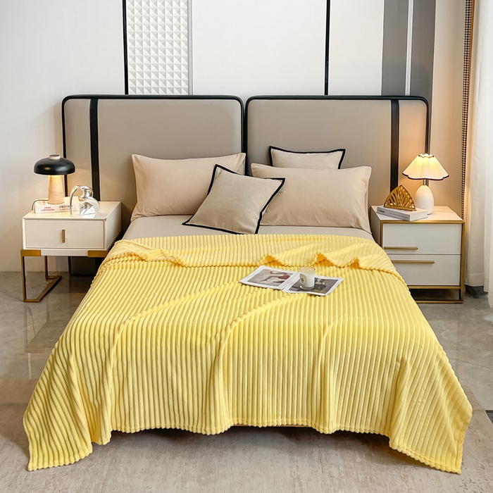 91家纺网 家纺一手货源 找家纺 一帆毯业 2024新款抽条压缩代发抽空跨境外贸260克兔毛珊瑚法兰绒空调毯子抽条毛毯简约牛奶绒盖毯 柠檬黄