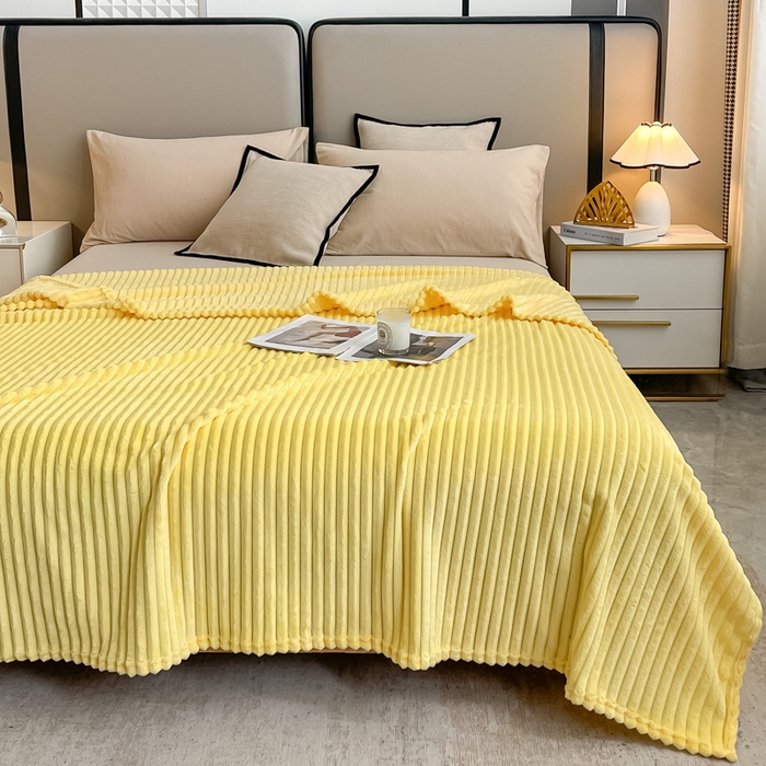 91家纺网 家纺一手货源 找家纺 一帆毯业 2024新款抽条压缩代发抽空跨境外贸260克兔毛珊瑚法兰绒空调毯子抽条毛毯简约牛奶绒盖毯 柠檬黄