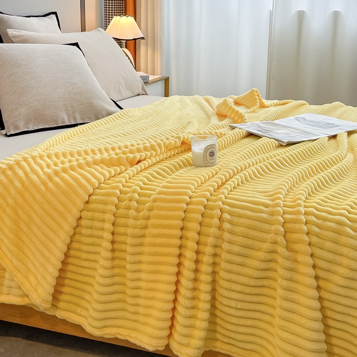 91家纺网 家纺一手货源 找家纺 一帆毯业 2024新款抽条压缩代发抽空跨境外贸260克兔毛珊瑚法兰绒空调毯子抽条毛毯简约牛奶绒盖毯 柠檬黄