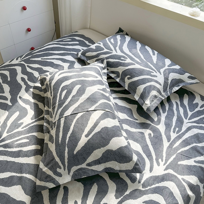 91家纺网 家纺一手货源 找家纺 梵巢 家纺芦荟棉枕套磨毛化纤枕套48*74cm斑马纹