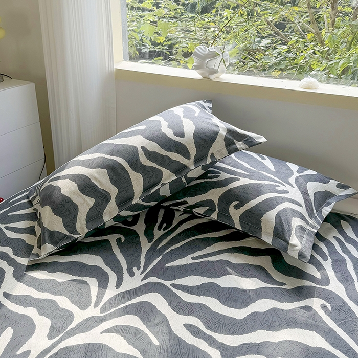 91家纺网 家纺一手货源 找家纺 梵巢 家纺芦荟棉枕套磨毛化纤枕套48*74cm斑马纹