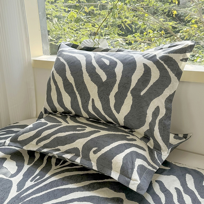 91家纺网 家纺一手货源 找家纺 梵巢 家纺芦荟棉枕套磨毛化纤枕套48*74cm斑马纹