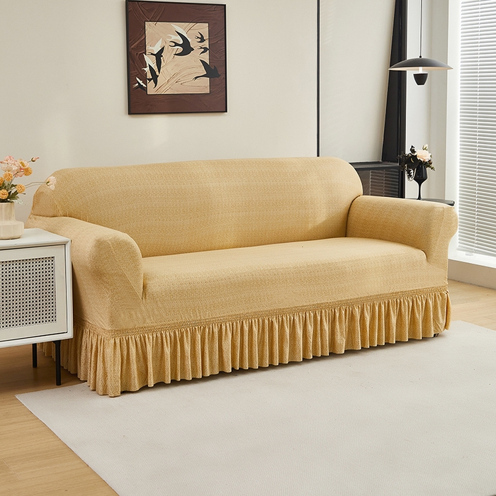 91家纺网 家纺一手货源 找家纺 共鸣沙发套 2024新款牛奶丝系列沙发套（裙摆款） 简约米黄