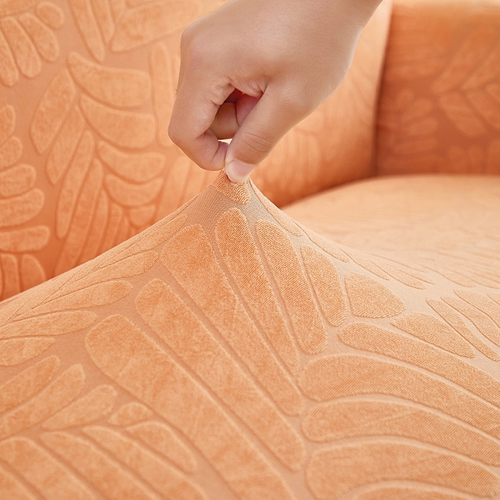 91家纺网 家纺一手货源 找家纺 共鸣沙发套 2024新款臻品提花系列沙发套（裙摆款织叶花系） 织叶卡橙