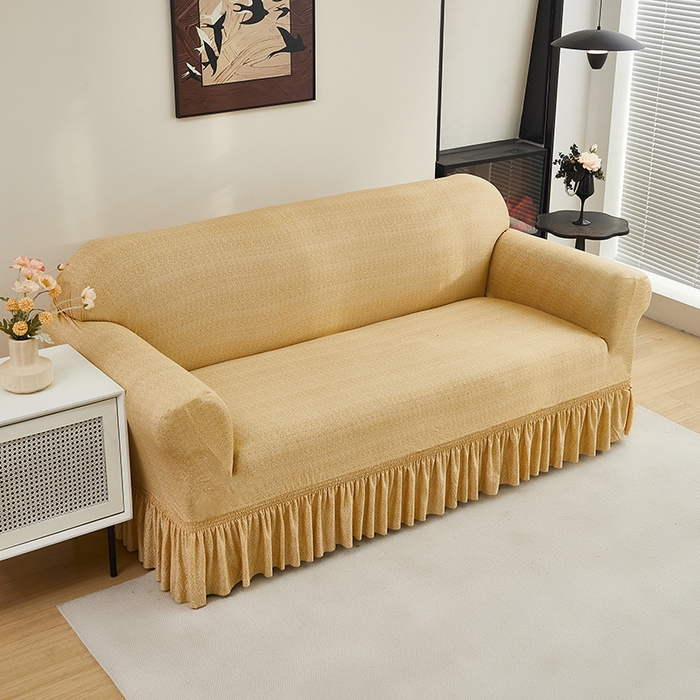 91家纺网 家纺一手货源 找家纺 共鸣沙发套 2024新款牛奶丝系列沙发套（裙摆款） 简约米黄