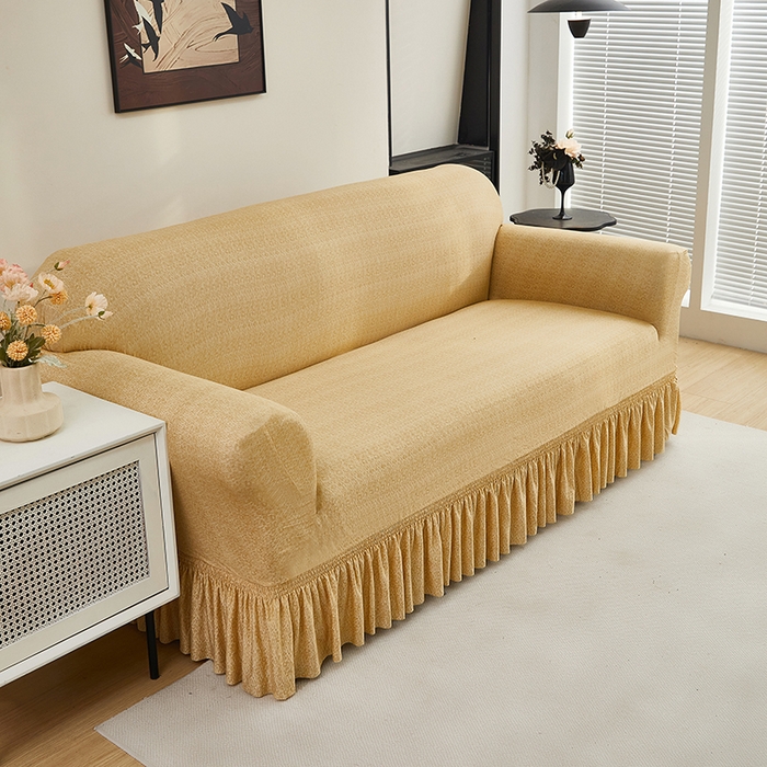 91家纺网 家纺一手货源 找家纺 共鸣沙发套 2024新款牛奶丝系列沙发套（裙摆款） 简约米黄