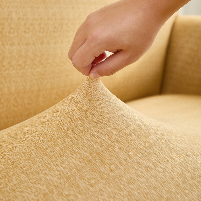 91家纺网 家纺一手货源 找家纺 共鸣沙发套 2024新款牛奶丝系列沙发套（裙摆款） 简约米黄