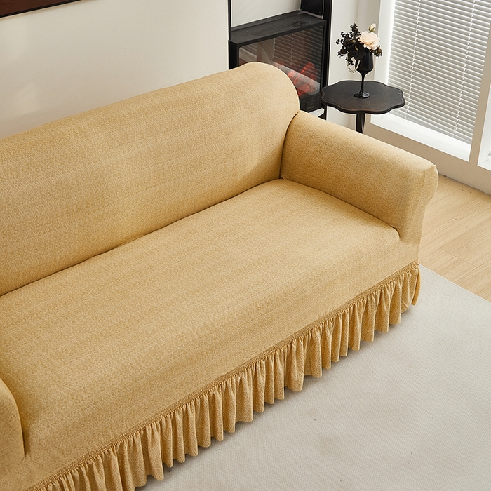 91家纺网 家纺一手货源 找家纺 共鸣沙发套 2024新款牛奶丝系列沙发套（裙摆款） 简约米黄