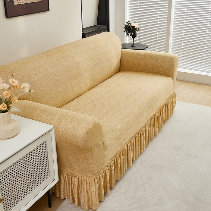 91家纺网 家纺一手货源 找家纺 共鸣沙发套 2024新款牛奶丝系列沙发套（裙摆款） 简约米黄